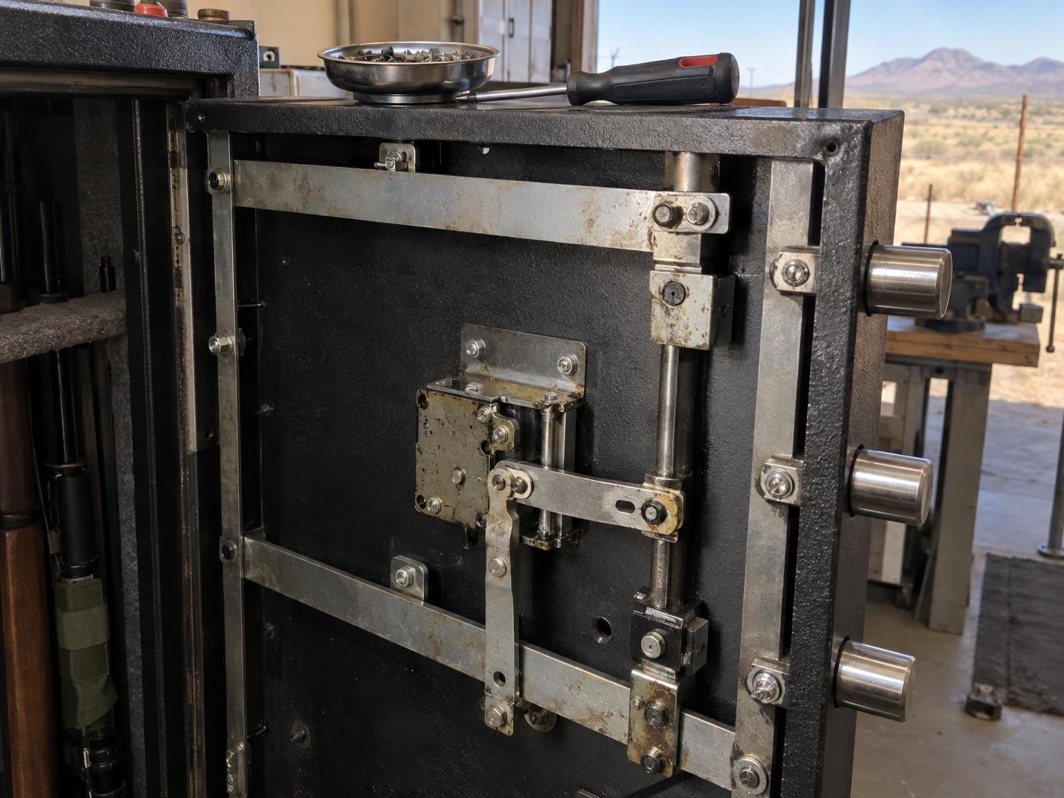 Servicing the boltwork inside a gun safe door