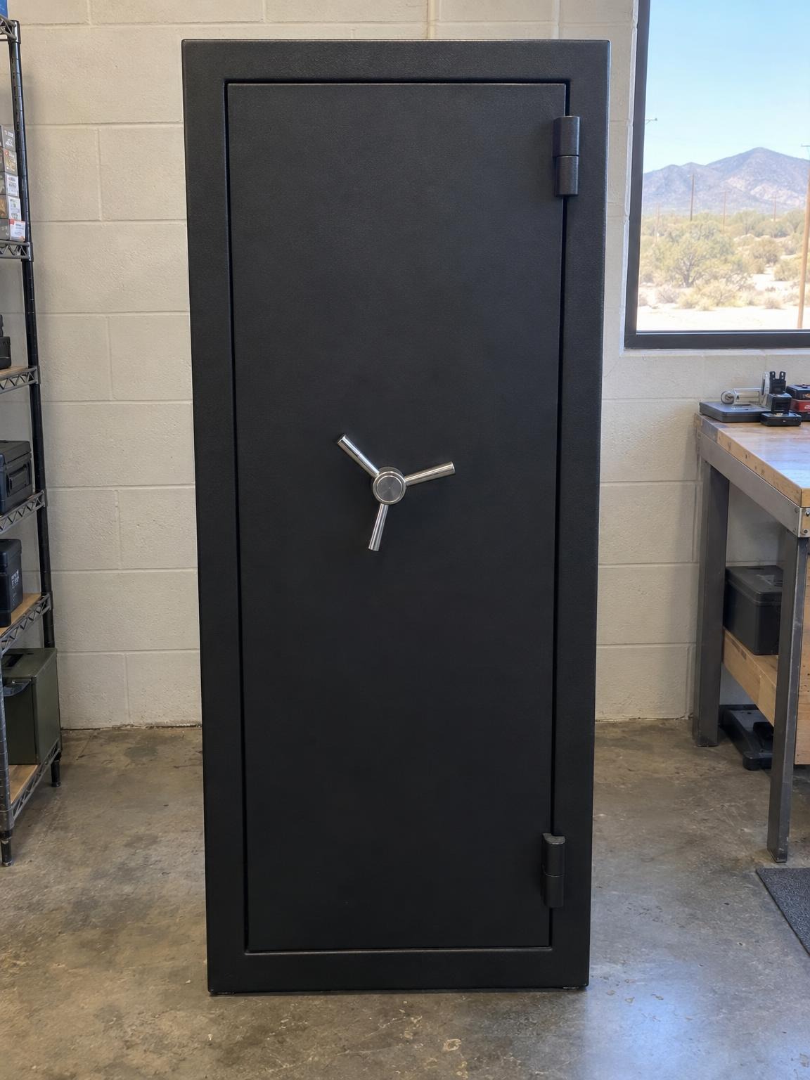 Matte black steel gun safe with a spoke handle