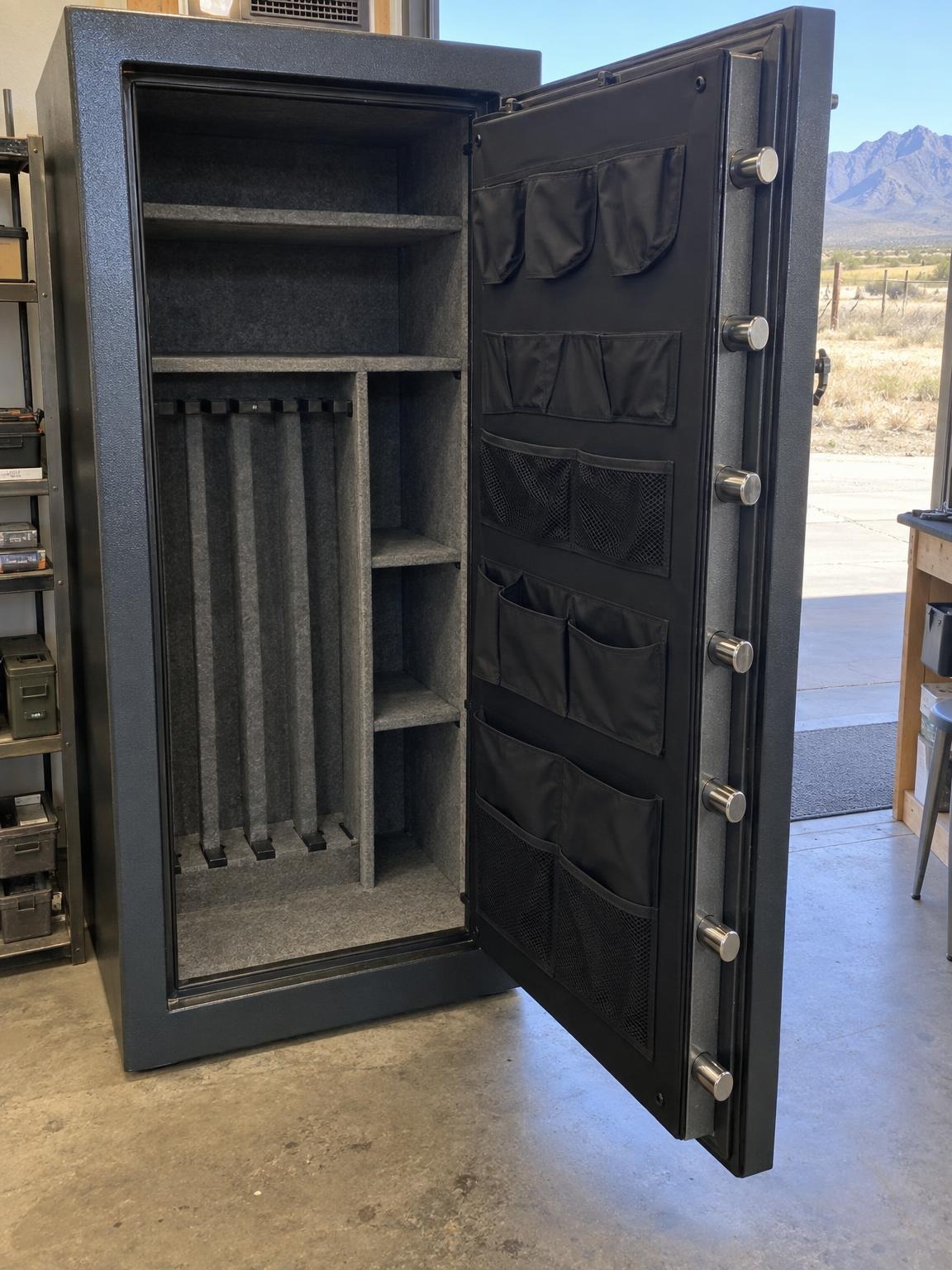 Open gun safe with its locking bolts and rifle rack on the showroom floor